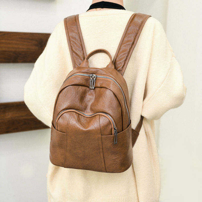 Experience Comfort and Durability with Unisex Trapezoid PU Leather Mini Backpack